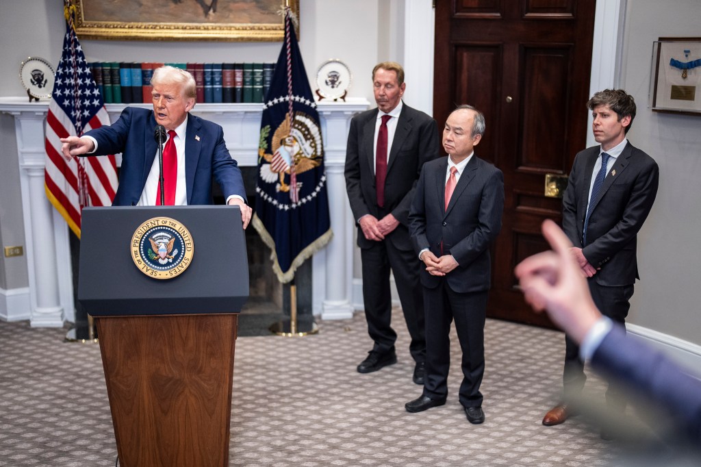 President Trump on Tuesday with Larry Ellison, son of Masayoshi and Sam Altman.